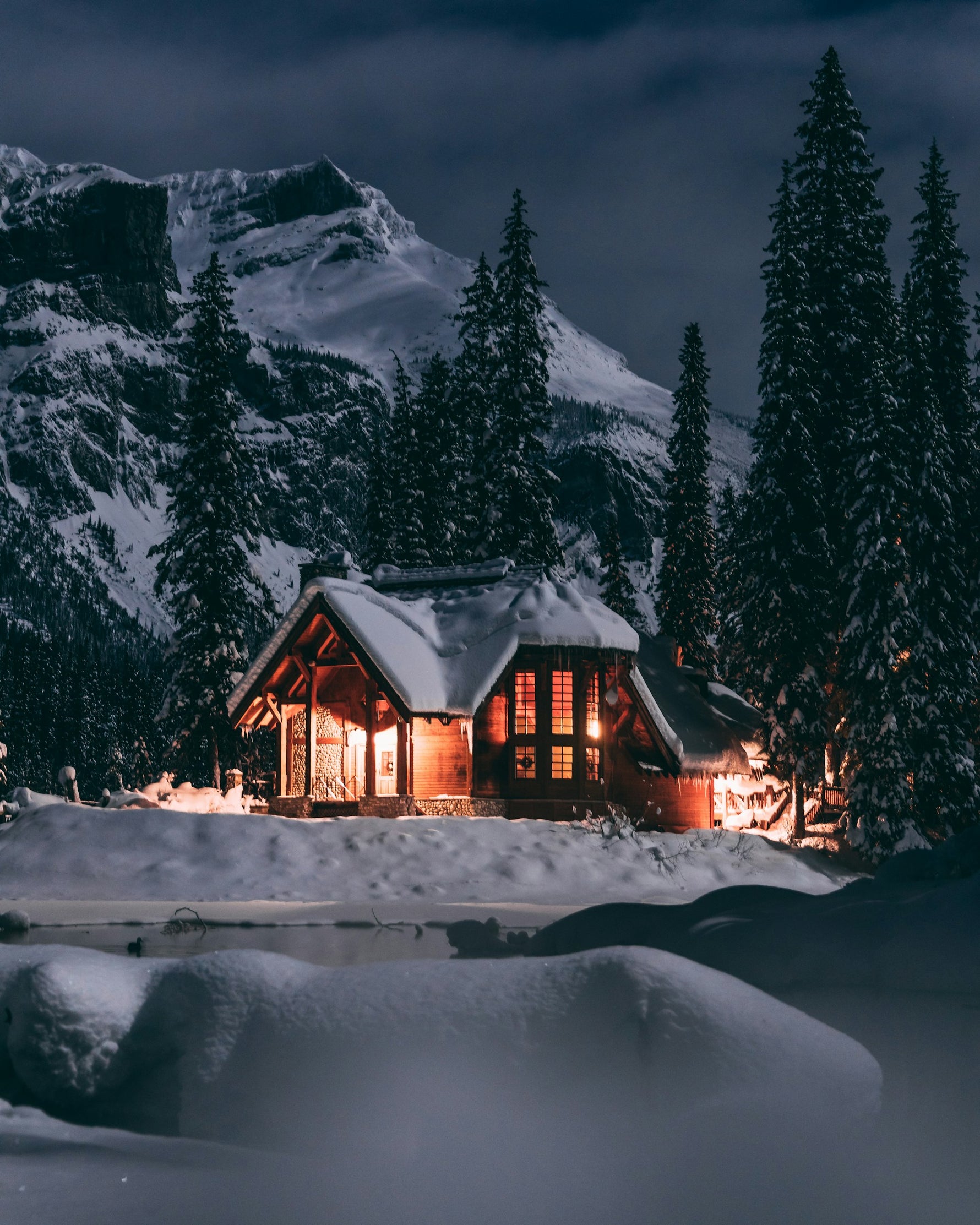Winter log cabin in snowy cold weather