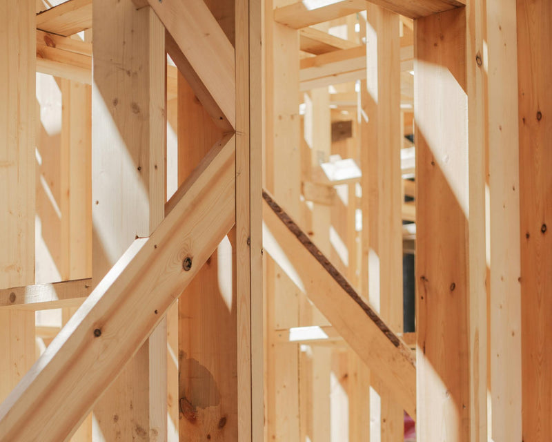 Strong solid wood beams holding up building
